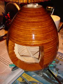 egg part of the fretwork clock formed with wood slides of plywood