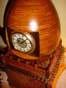 scroll saw egg clock with golden clock insert and glossy finish