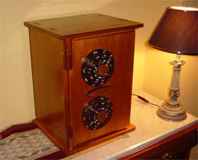 completed scroll saw security box by a black table lamp